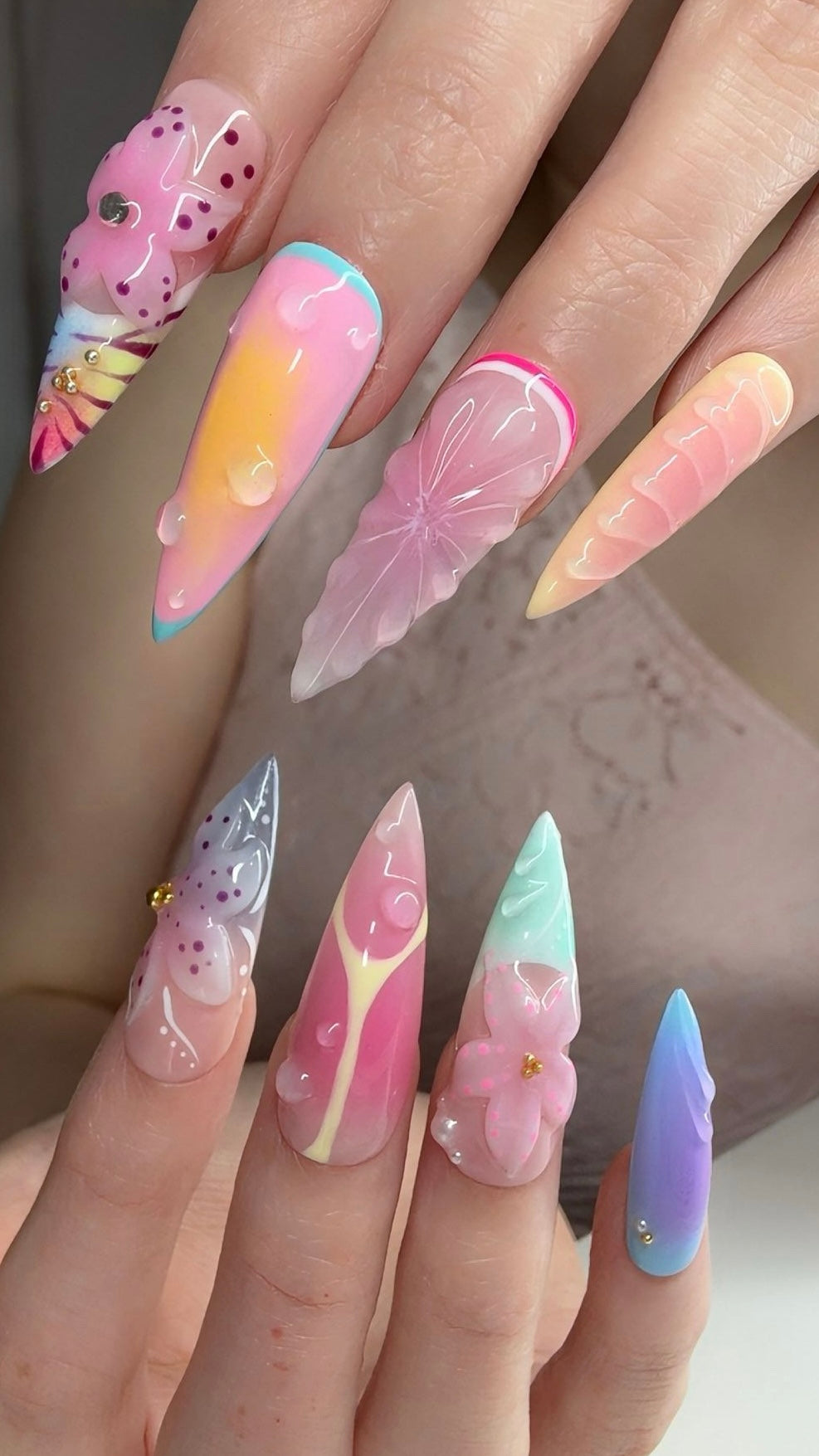 Woman wearing Zara Larsson inspired stiletto press-on nails
